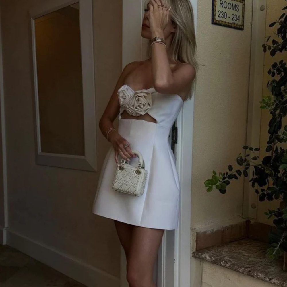 Yojani Boutique white mini dress w/rose embellishment! So cute for a 2nd look!!